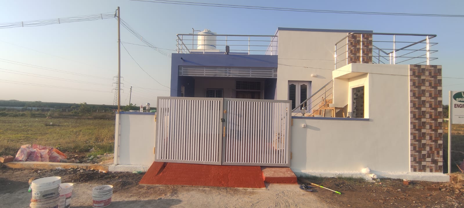 Front facade of a completed independent home handed over by Sripad Builders